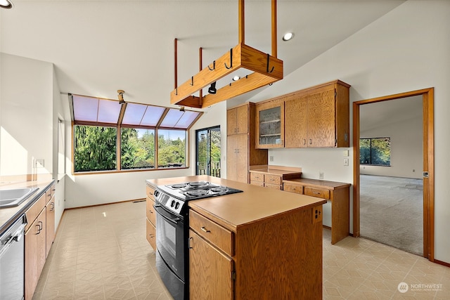 kitchen with black range with electric stovetop, dishwasher, a center island, light colored carpet, and vaulted ceiling