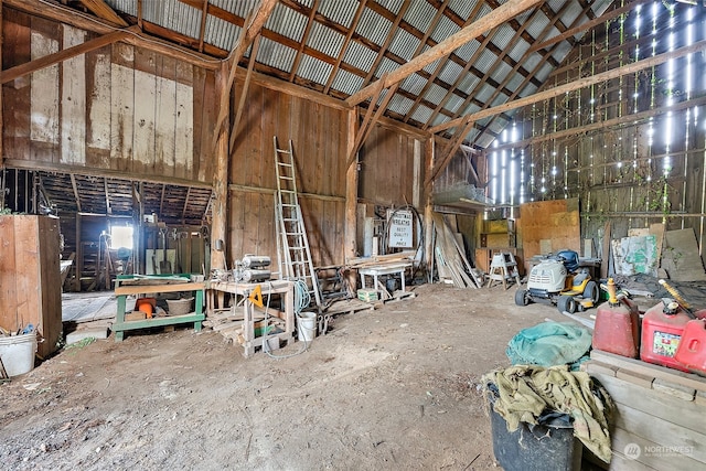 misc room with high vaulted ceiling