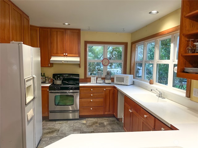 kitchen with sink and white appliances