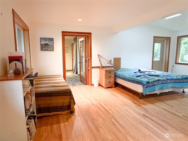 bedroom with light hardwood / wood-style floors