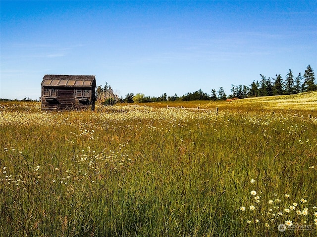 view of landscape with a rural view