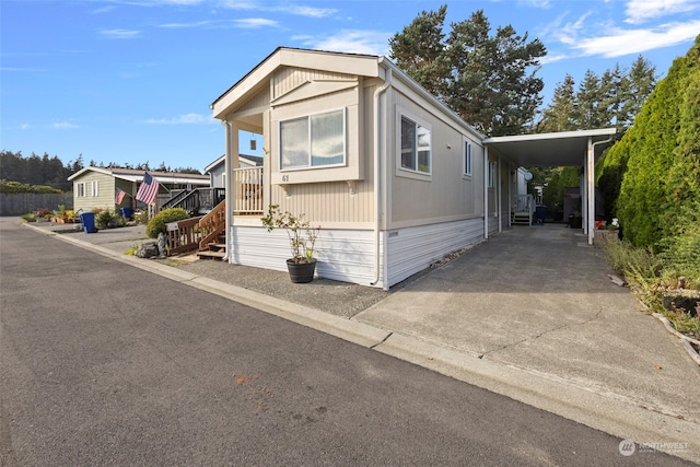 manufactured / mobile home with a carport