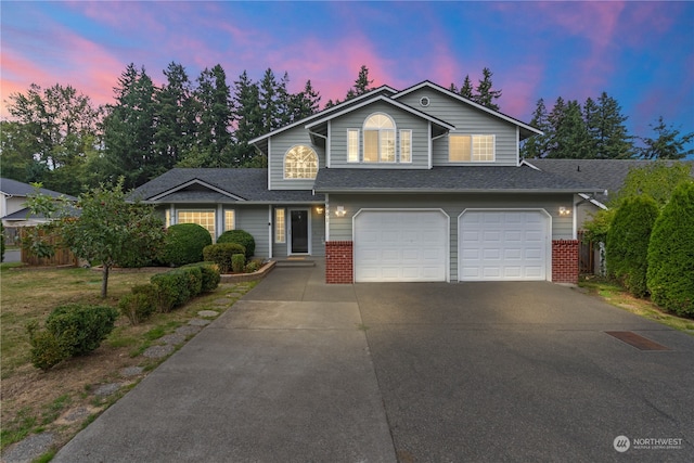 view of front of property with a garage