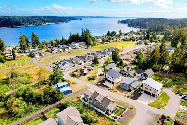 drone / aerial view with a water view