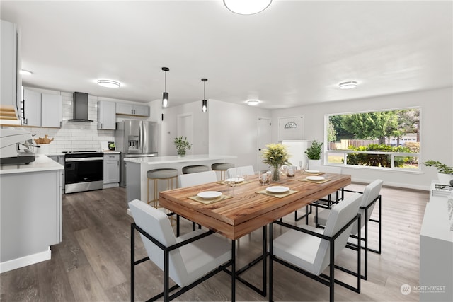 dining room with dark wood-type flooring