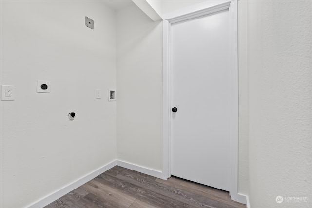 washroom featuring hookup for a washing machine, dark hardwood / wood-style flooring, and hookup for an electric dryer