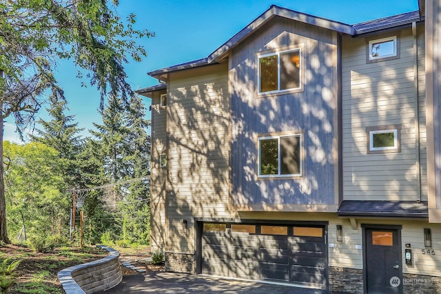 view of home's exterior featuring a garage