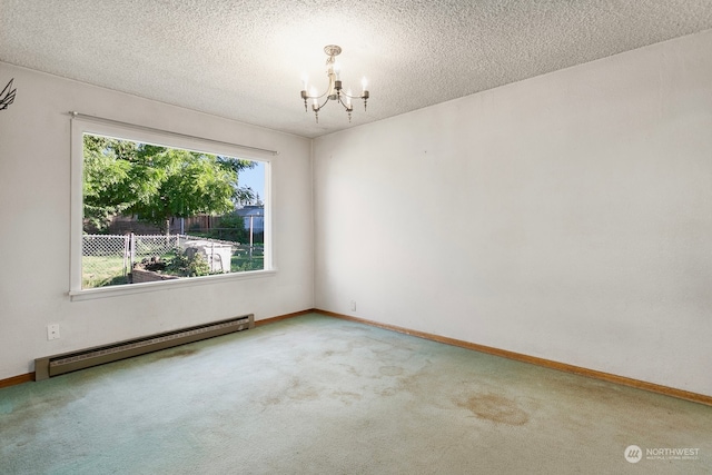 carpeted empty room featuring a baseboard radiator, a notable chandelier, and a textured ceiling