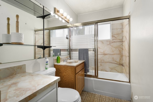 full bathroom with crown molding, shower / bath combination with glass door, vanity, and toilet