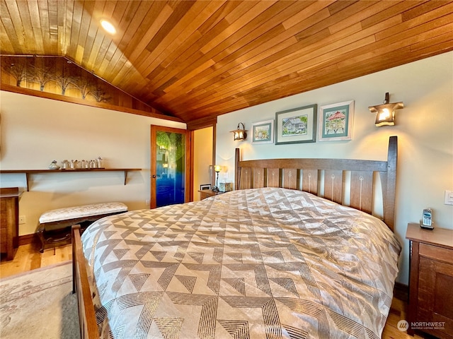 bedroom featuring wood-type flooring, lofted ceiling, and wood ceiling