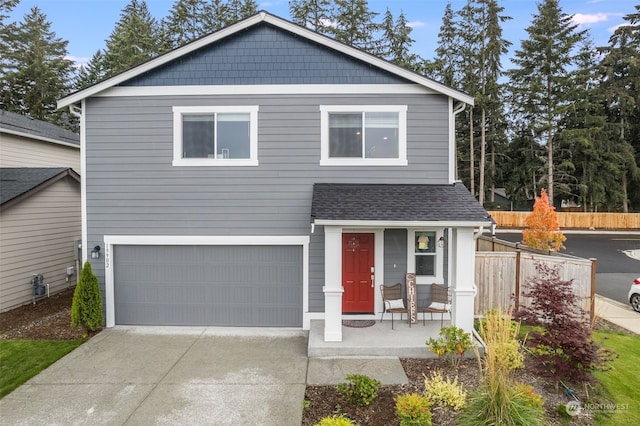 view of front of property with a garage