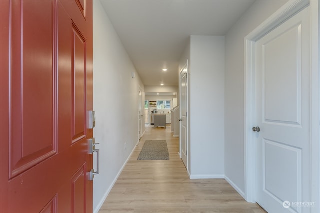 hall featuring light hardwood / wood-style flooring