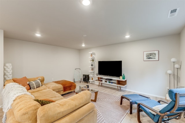 living room with light hardwood / wood-style floors