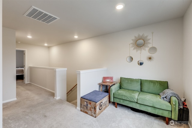 sitting room featuring carpet