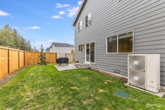 view of yard with a patio and ac unit