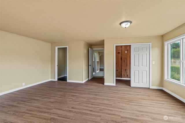 unfurnished bedroom with light hardwood / wood-style flooring