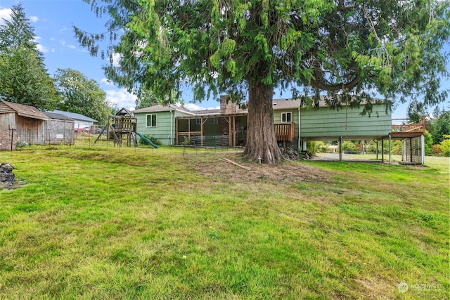 view of yard with a playground