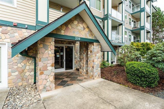 doorway to property with a balcony