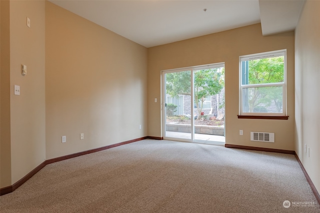 unfurnished room with carpet