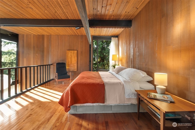 bedroom with wood ceiling, beam ceiling, and hardwood / wood-style floors