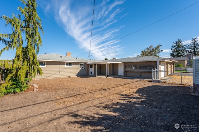 ranch-style home with a patio