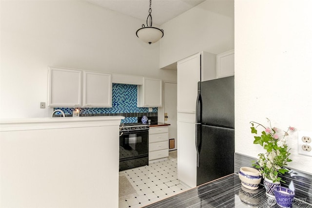 31717 48th Ln SW Unit A, Federal Way, WA 98023 - kitchen with black appliances, white cabinets, backsplash, light flooring, and a towering ceiling