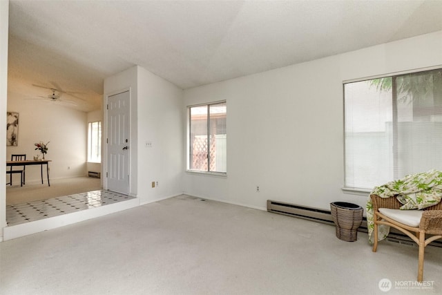31717 48th Ln SW Unit A, Federal Way, WA 98023 - carpeted empty room featuring a baseboard heating unit and ceiling fan