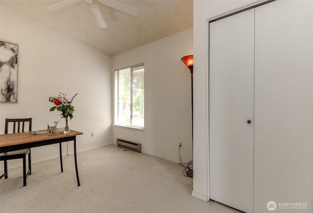 31717 48th Ln SW Unit A, Federal Way, WA 98023 - carpeted office space featuring a baseboard heating unit, ceiling fan, and a textured ceiling