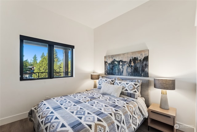 bedroom featuring wood-type flooring