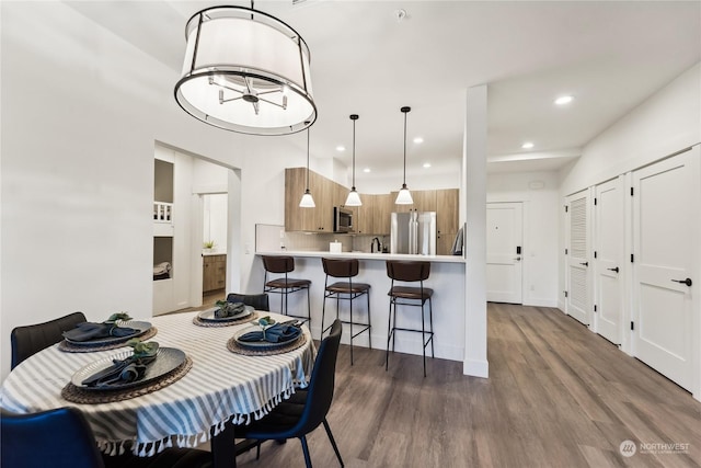 3760 Suncadia Trl Unit 313, Cle Elum, WA 98922 - dining room with baseboards, recessed lighting, and wood finished floors