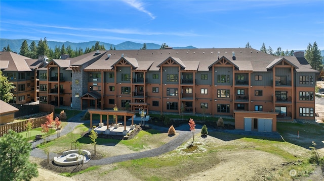 view of building exterior with a mountain view