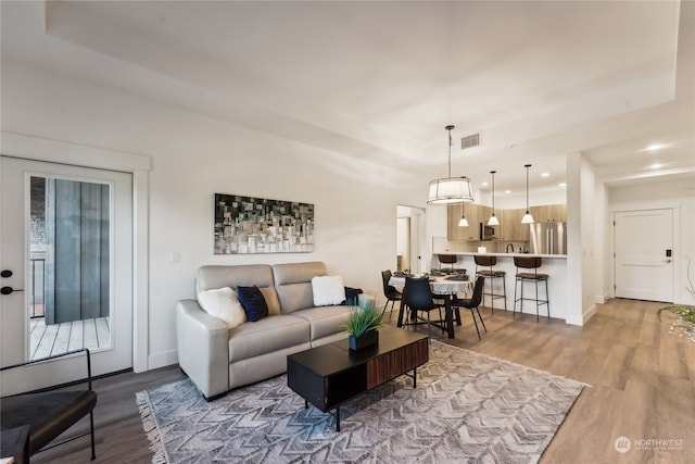 living room with hardwood / wood-style floors