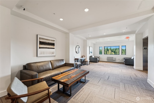 carpeted living room featuring a wall mounted AC