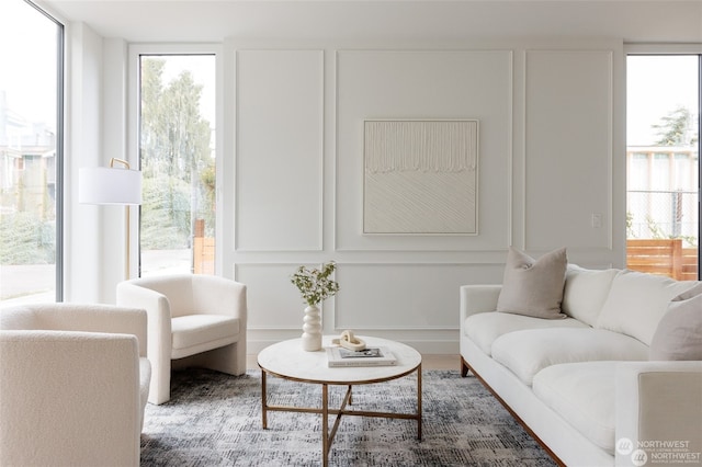 living room featuring plenty of natural light