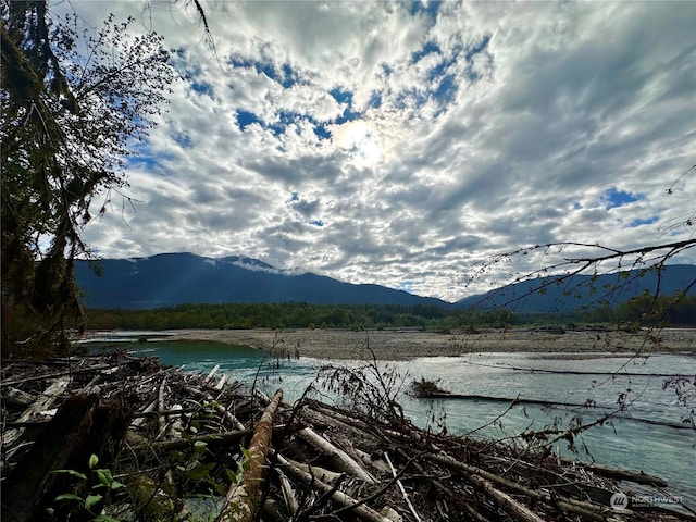 property view of mountains featuring a water view