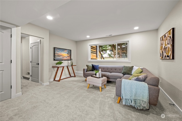 living room featuring light carpet