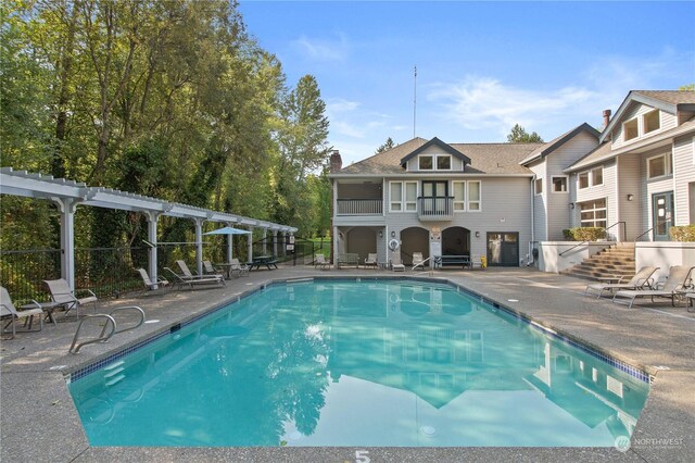 view of pool featuring a patio