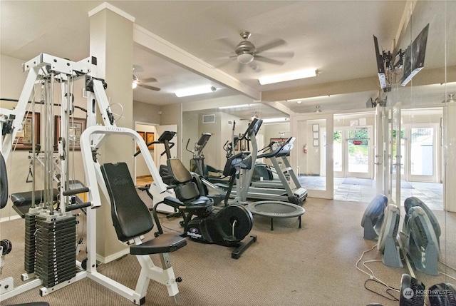 workout area with ceiling fan and french doors