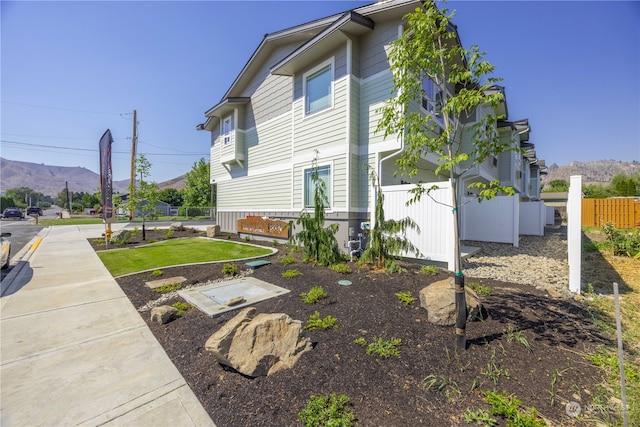 view of home's exterior featuring a mountain view