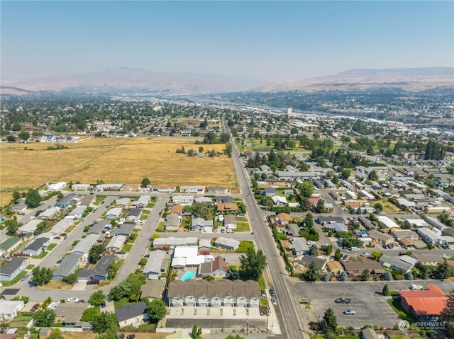 drone / aerial view featuring a mountain view