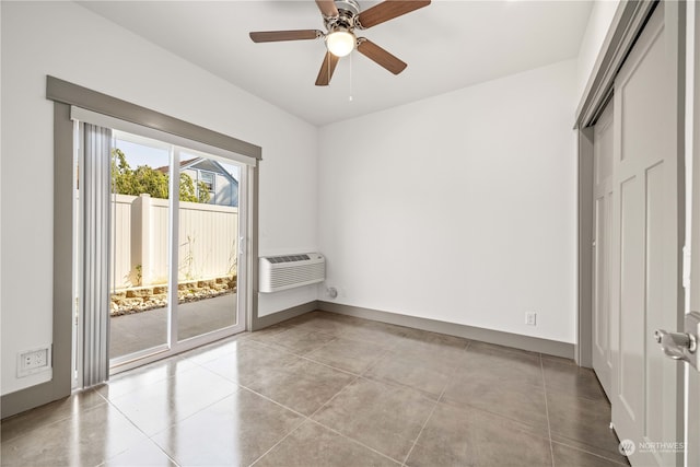 interior space with light tile patterned floors and ceiling fan