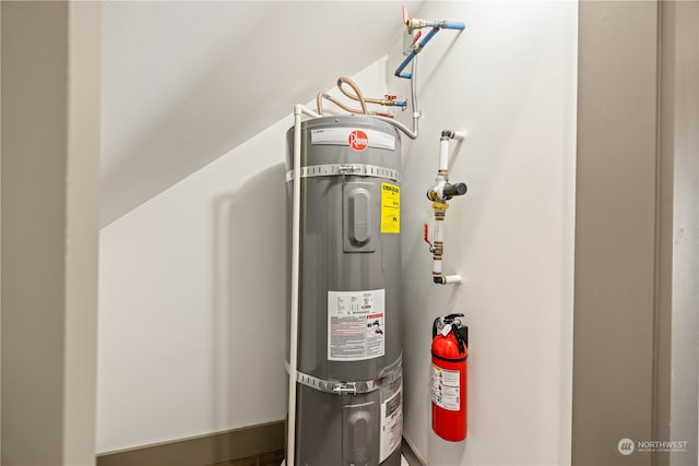 utility room with water heater