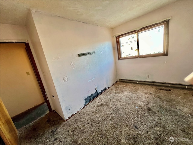 interior space with a textured ceiling