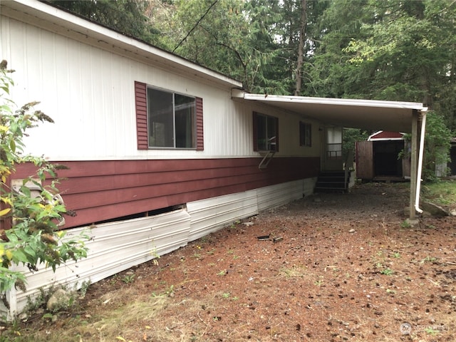 view of property exterior with a carport