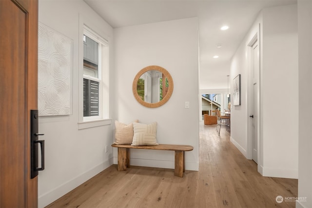 hall with light wood-type flooring