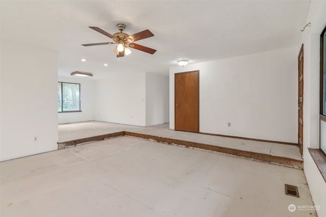 spare room with ceiling fan