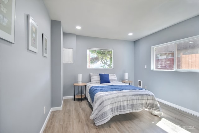 bedroom featuring light wood-type flooring