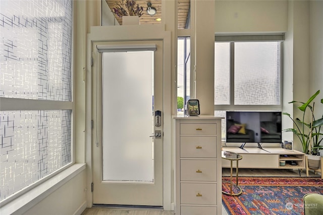 doorway featuring light wood-type flooring