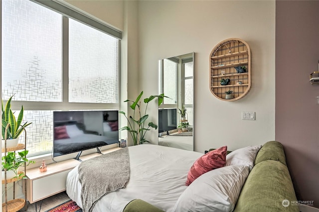 bedroom featuring hardwood / wood-style flooring