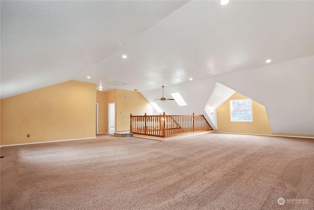 additional living space with recessed lighting, carpet floors, and lofted ceiling